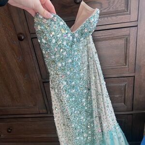 Elegant Beaded Strapless Gown